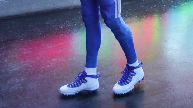 Detroit Lions quarterback Jared Goff's blue and white Air Jordan cleats.